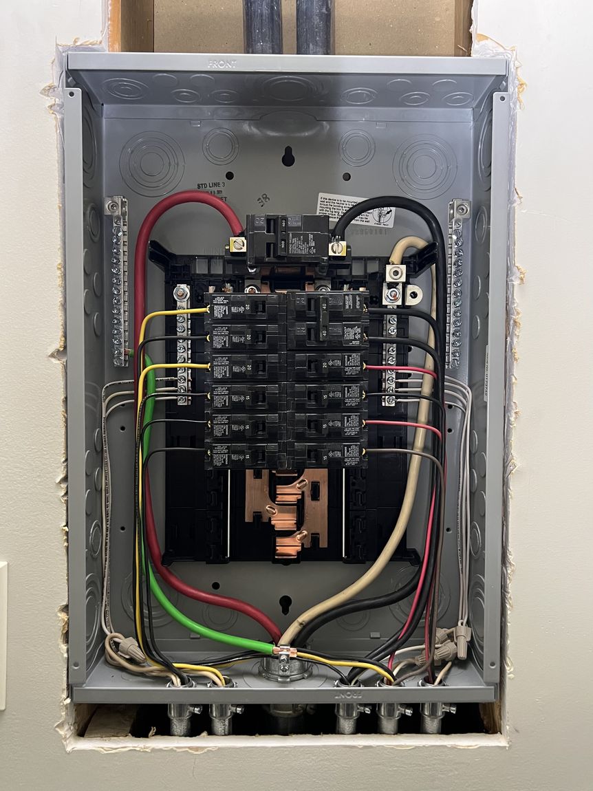 Clean, labeled breaker panel wired by Peak Property Electric