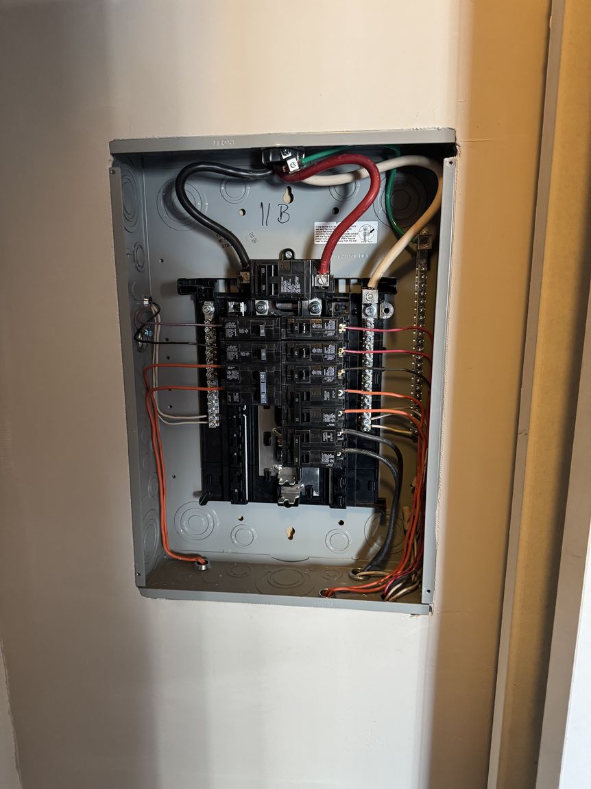 Neatly wired electrical panel on a residential service upgrade
